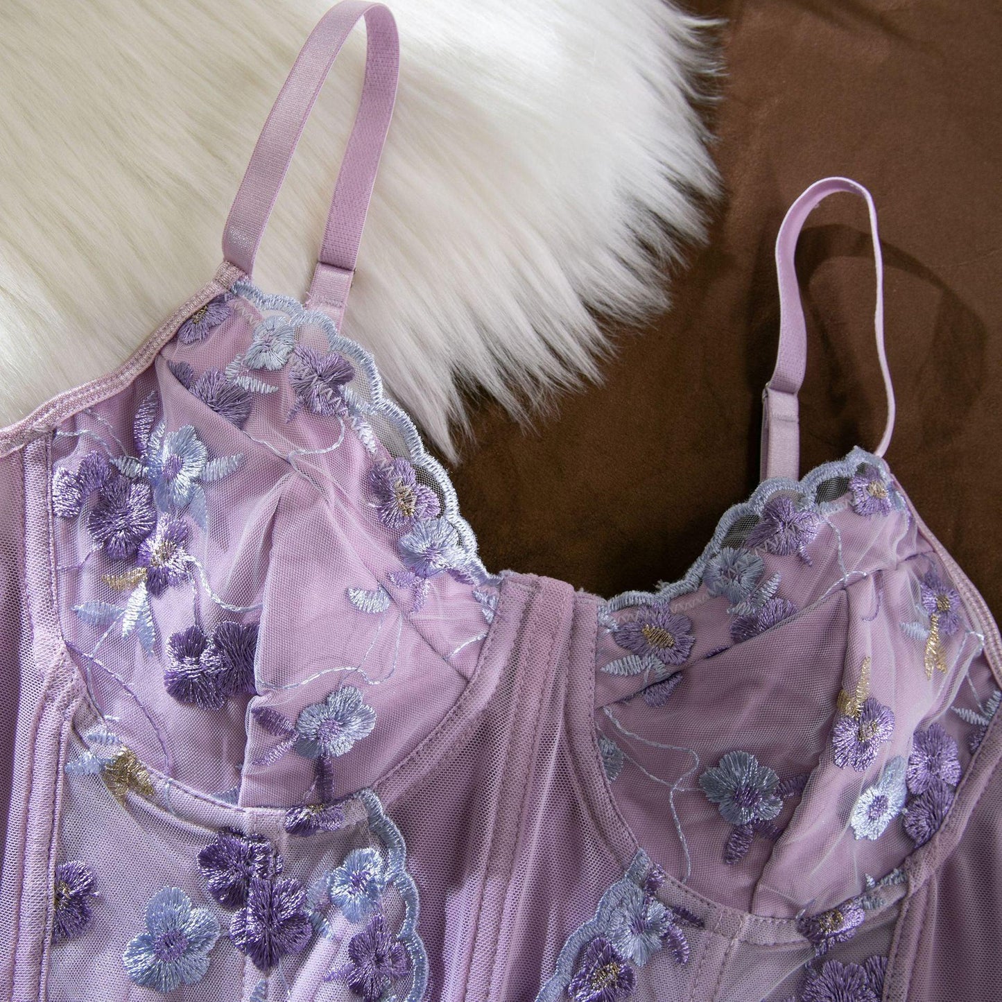 Sexy girl wearing embroidered vest with underwear - Rock Candy