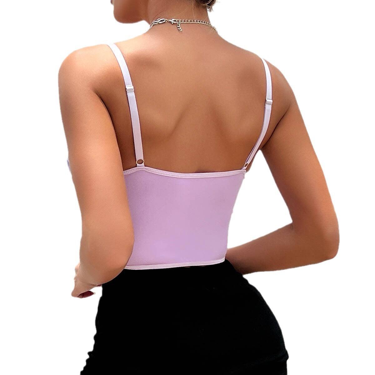 Sexy girl wearing embroidered vest with underwear - Rock Candy